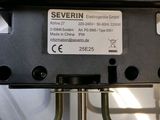 a close up of a device on a metal pole