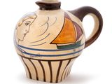 a vase with a woman on it on a white background