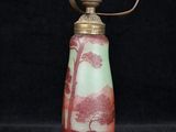 an image of a lamp with a red and green design on it