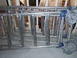 a picture of a metal gate in a room
