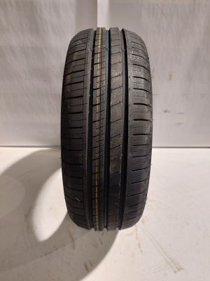 a close up of a tire on a white surface