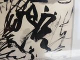 une photo d'une photo d'un tableau sur le mur