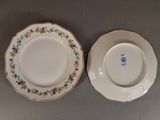 two plates that are sitting next to each other on a table