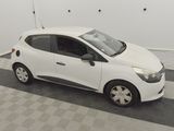 a picture of a small white car parked in a garage