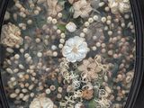 a picture of a picture of a flower arrangement in a picture frame
