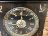 a clock that is sitting on top of a table