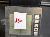 a close up of a machine with a sticker on it