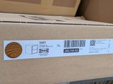 a box with a label on it sitting on a carton