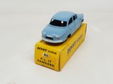 a blue toy car sitting on top of a yellow box