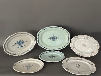 six blue and white plates with floral designs on them on a table