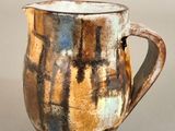 a close up of a coffee cup on a table