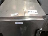 a stainless steel dishwasher that is sitting in a room