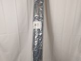 a roll of plastic wrapped up on a white surface