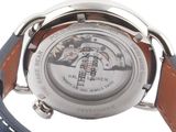 a close up of a watch on a white background