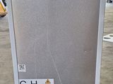 an image of a refridgerator in a garage