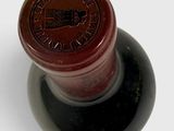a bottle of wine that is sitting on a table