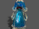 une figurine en verre représentant une femme en robe bleue