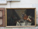 a picture of a painting on the wall next to a window