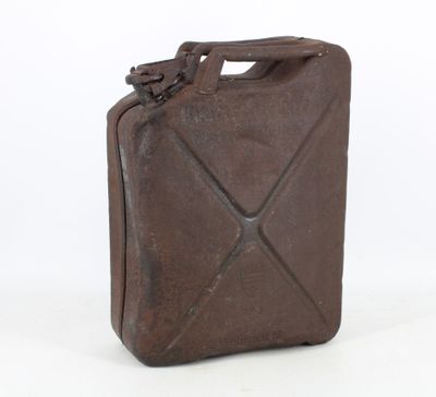 an old brown metal canister with a handle on a white background