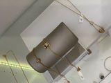 necklaces and bracelets are displayed on display in a jewelry store