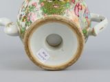 an image of a vase with a handle on a table