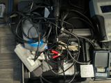 a bunch of electronics in a box on the floor