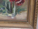 a painting of red flowers in a vase on a table