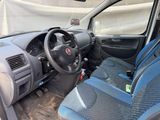 the interior of a car with a steering wheel and a dashboard