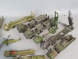 a lot of military toys that are on a white surface