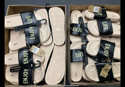 several pairs of black and white flip flop flop flop flop flop flop flop flop flop flop flop flop flop flop