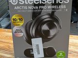 an image of a box of steelseries headphones sitting on a wooden table