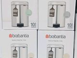 three boxes of brabantia rice cookers on display in a store
