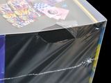 a clear box with a picture on it on a black background
