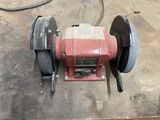 a red machine that is sitting on a table