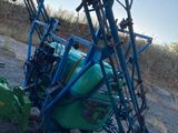a tractor that is sitting on the side of the road