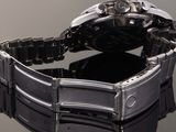a close up of a watch on a table