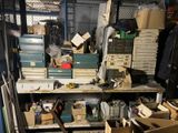 a lot of boxes and boxes on a shelf in a room