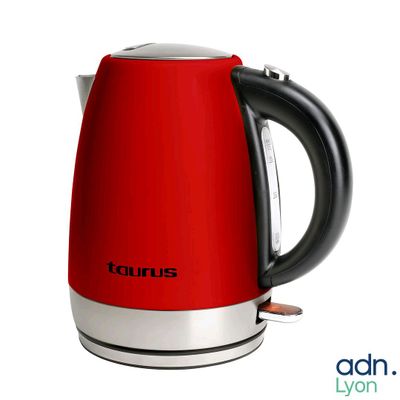 a red electric tea kettle on a white background