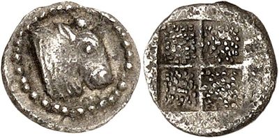 a silver coin with an image of a horse on it