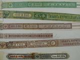 several different types of currency are displayed on a piece of paper