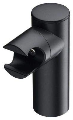 un gros plan d'un objet noir sur fond blanc