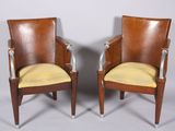 pair of art deco armchairs with leather upholstered seats