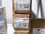 several boxes are stacked on top of each other on a table