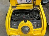 a close up of a yellow car with a radio in it
