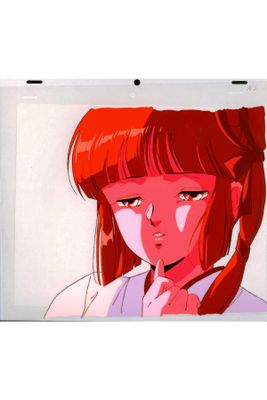 a drawing of a girl with red hair on a laptop