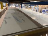 a large sheet of plywood in the middle of a building