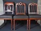 three chairs that are next to each other on the floor