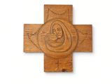 an image of a wooden cross with an image of jesus and mary on it