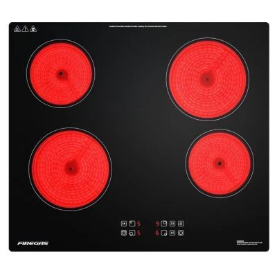 un gros plan sur une plaque de cuisson noire et rouge à quatre feux