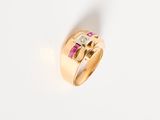 an image of a gold ring with pink and white stones